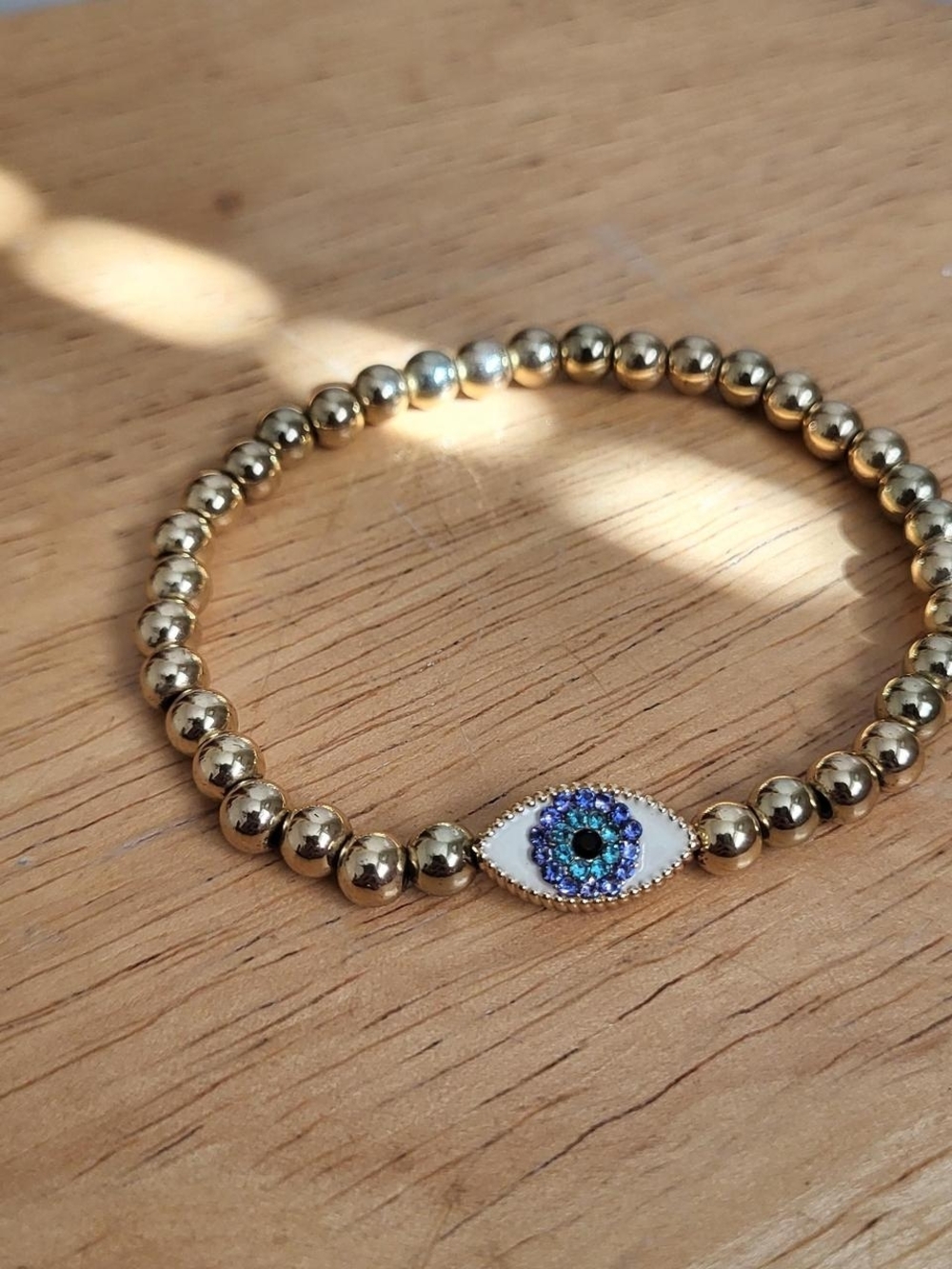 Gold Beaded Bracelet with Blue Evil Eye Accent